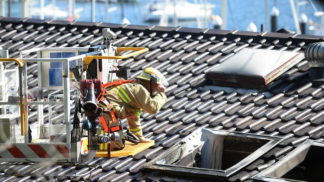 Daytime photos of the fire which caused approx $500 000 damage to the Middle Harbour Yacht Club. The fire appears to have started in the restaurant area and is being treated as suspicious and under investigation. Picture: ELENOR TEDENBORG