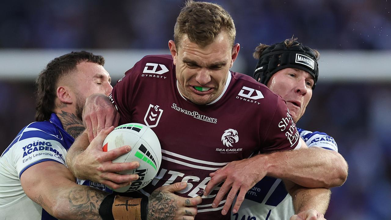 SYDNEY, AUSTRALIA - SEPTEMBER 15: Tom Trbojevic of the Sea Eagles charges forward during the NRL Qualifying Final match between Canterbury Bulldogs and Manly Sea Eagles at Accor Stadium on September 15, 2024 in Sydney, Australia. (Photo by Cameron Spencer/Getty Images)