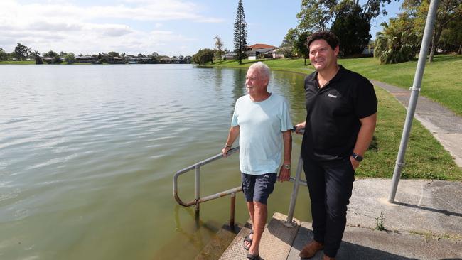 Lake Hugh Muntz is open again after close to a year of being shut due to red algae levels. Cr Nick Marshall (black shirt) with local lake activist John McManus happy with the lake. Picture Glenn Hampson