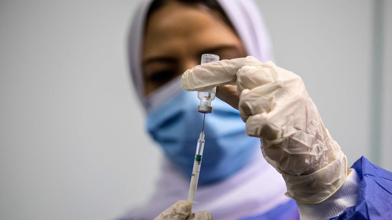 A medical worker administering a dose of the AstraZeneca vaccine. Picture: Khaled Desouki/AFP