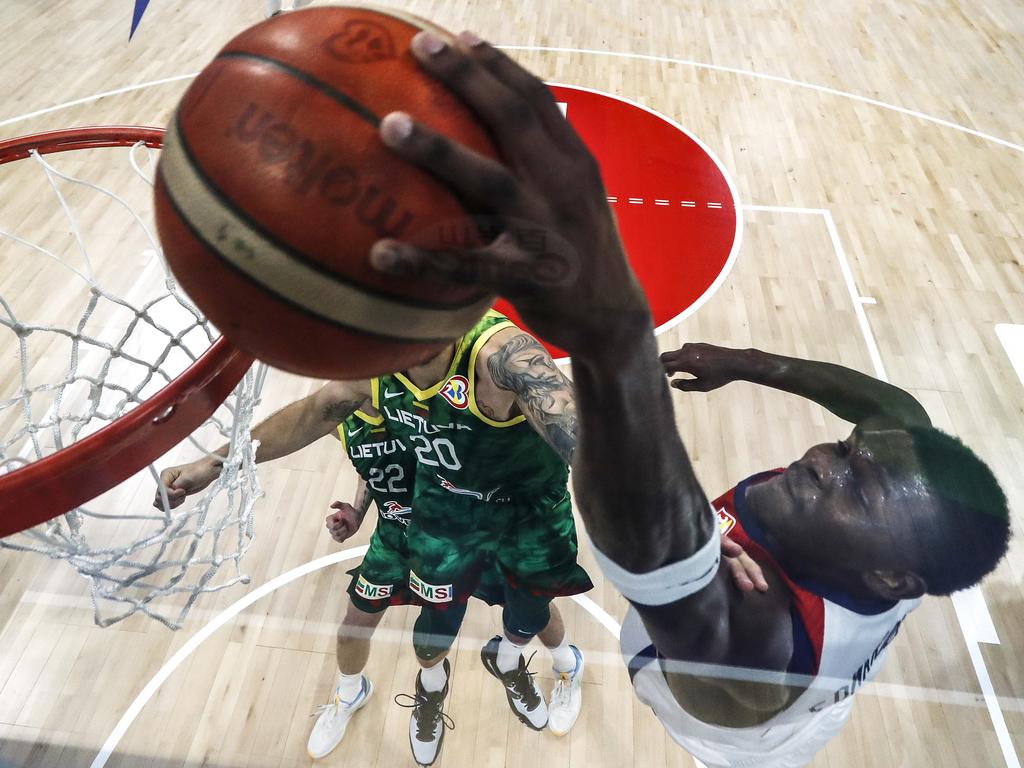 US top scorer Anthony Edwards attempts to dunk against Donatas Motiejunas of Lithuania. Picture: Yong Teck Lim/Getty Images