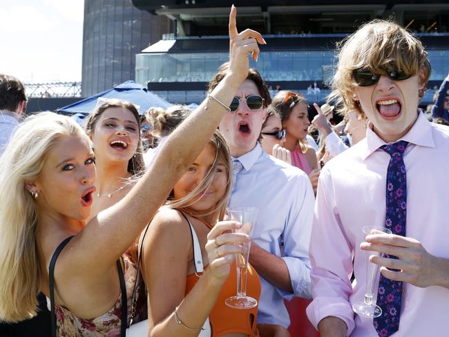 These young punters were enjoying life post lockdown at Randwick in 2021. Picture: Jonathan Ng