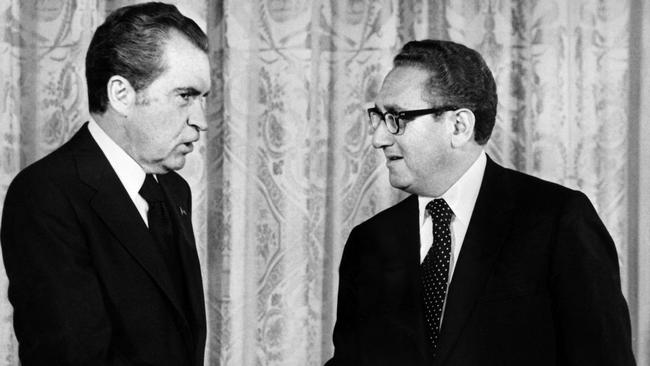 Former US president Richard Nixon (L) shakes hands with Henry Kissinger, former foreign Secretary of State. Pilger emphasised the broader truth about Western government collusion, particularly the U.S. and Britain, in supporting the rise of the Khmer Rouge. Picture: AFP