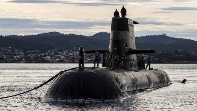 HOBART, AUSTRALIA - APRIL 01: In this handout image provided by the Australian Defence Force, Royal Australian Navy submarine HMAS Sheean arrives for a logistics port visit on April 1, 2021 in Hobart, Australia. Australia, the United States and the United Kingdom have announced a new strategic defence partnership - known as AUKUS - to build a class of nuclear-propelled submarines and work together in the Indo-Pacific region. The new submarines will replace the Royal Australian Navy's existing Collins submarine fleet. (Photo by LSIS Leo Baumgartner/Australian Defence Force via Getty Images)