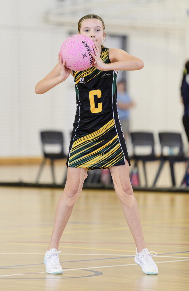 Peyton Courtney of Centenary Heights State School in the Laura Geitz Cup netball carnival at The Glennie School, Sunday, March 16, 2025. Picture: Kevin Farmer