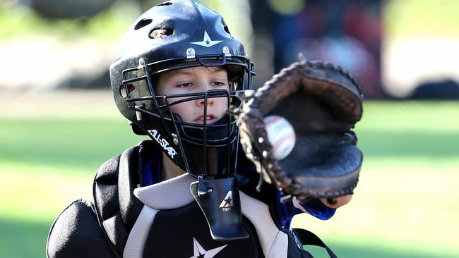 Junior baseball spread - Deakin Blues v Guild-Lara.  Picture: Mike Dugdale