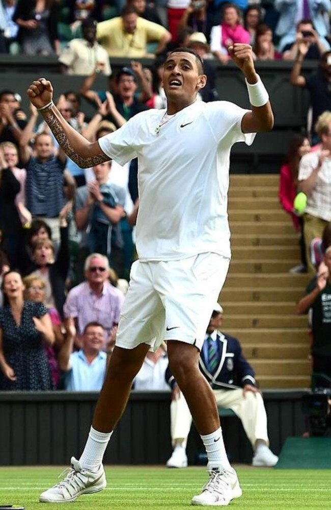 Nick Kyrgios celebrates his victory over Rafael Nadal in the 2014 Wimbledon fourth round.