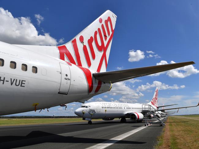 Consumer advocates have called on Australia’s banks to drop “exorbitant” interest rates on credit cards tied to Virgin Australia’s frequent flyer scheme. Picture: AAP