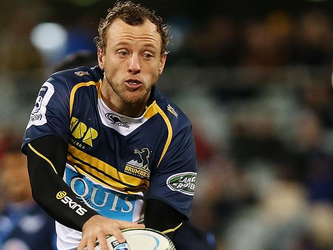 CANBERRA, AUSTRALIA - MAY 29: Jesse Mogg of the Brumbies passes the ball during the round 16 Super Rugby match between the Brumbies and the Bulls at GIO Stadium on May 29, 2015 in Canberra, Australia. (Photo by Stefan Postles/Getty Images)