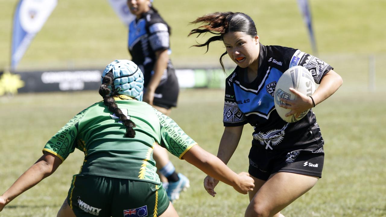 Action from Under 18 Girls Ozzy Cooks (cook islands) v Fiji. Harmony Nines Rugby League. Picture: John Appleyard