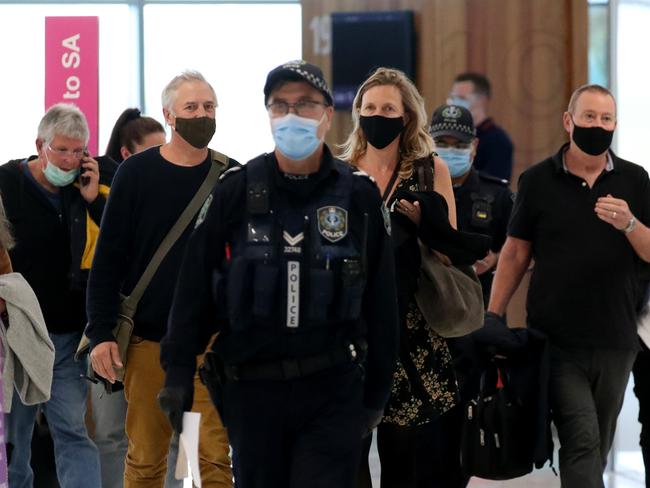 ADELAIDE, AUSTRALIA - NewsWire Photos 23rd June 2021: Passengers wearing masks at the Adelaide Airport. Picture: NCA NewsWire / Kelly Barnes