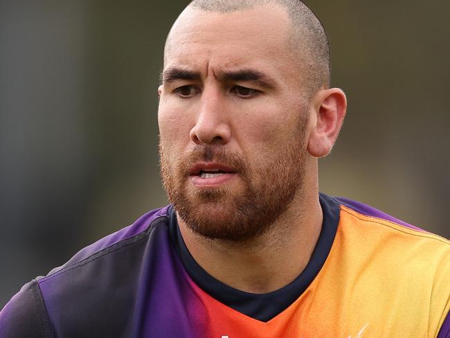 MELBOURNE, AUSTRALIA - APRIL 17: Nelson Asofa-Solomona of the Storm takes the ball during a Melbourne Storm NRL training session at Gosch's Paddock on April 17, 2024 in Melbourne, Australia. (Photo by Robert Cianflone/Getty Images)