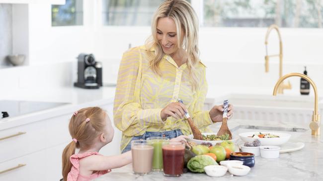 , NETWORK SPECIAL. MUST TALK WITH NETWORK PIC DESK BEFORE PUBLISHING. Nutritionist Amelia Phillips, 46, with daughter Ella. She runs the website ameliaphillips.com.au where people can go for access to recipes and easy home cooking courses.