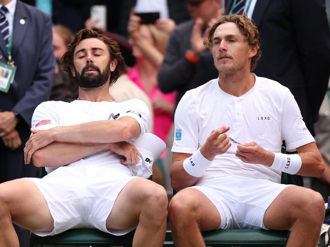 LONDON, ENGLAND - JULY 13: Jordan Thompson and Max Purcell of Australia look dejected following defeat against Henry Patten of Great Britain and Harri Heliovaara of Finland in the Gentlemen's Doubles Final during day thirteen of The Championships Wimbledon 2024 at All England Lawn Tennis and Croquet Club on July 13, 2024 in London, England. (Photo by Julian Finney/Getty Images)