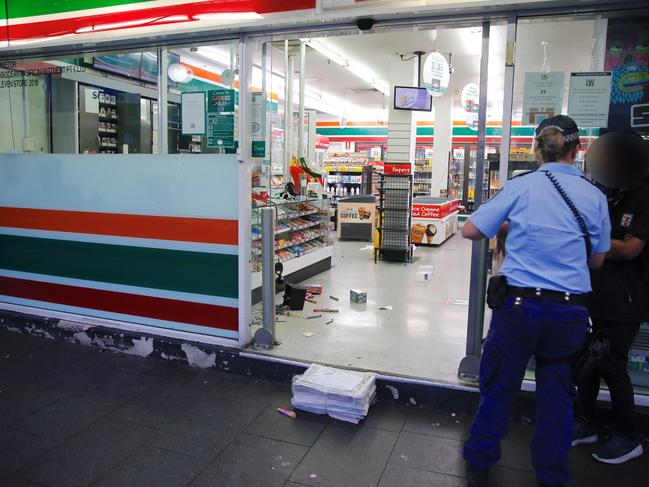 Police responding at the scene of the Newtown 7-Eleven