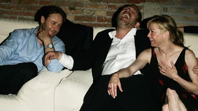 Actor Russell Crowe, producer Harvey Weinstein and actress Renée Zellweger attend the after-party for <i>Cinderella Man </i>in 2005. Picture: Pascal Le Segretain