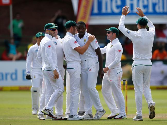 The South Africans celebrate after Kagiso Rabada took the wicket of Steve Smith on day one of the second Test.