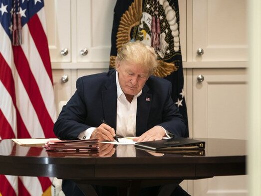 President Donald Trump resorts to longhand after being booted off social media platforms. Picture: Supplied