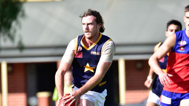 Tom Wallis in action for Essendon Doutta Stars in the EDFL. Picture: Jamie Morey