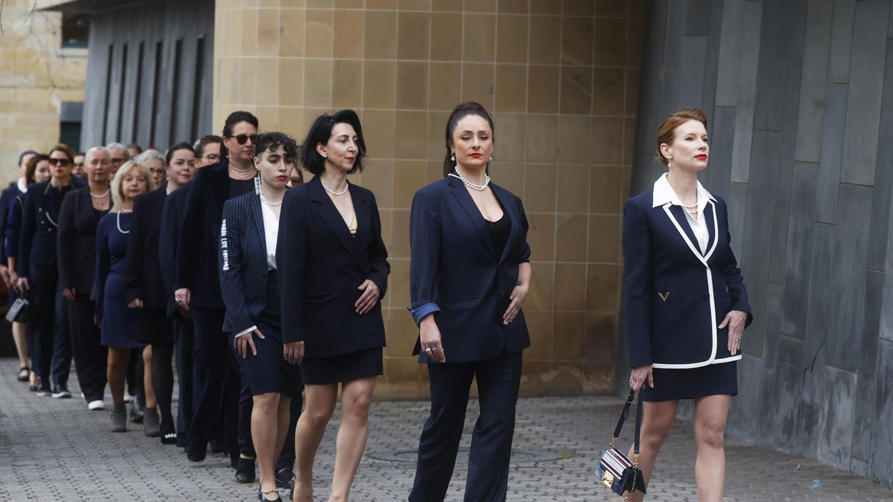 Kirsha Kaechele and ladies walking to the Supreme Court of Tasmania in Hobart for the first stage of their appeal against the shut down of the ladies lounge at MONA. Picture: Nikki Davis-Jones