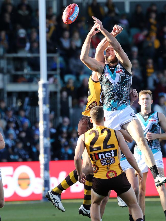 Port Adelaide's Jack Hombsch attempts to mark during the game against Hawthorn at UTAS Stadium. Picture: Chris Kidd