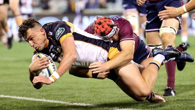 Brumbies fullback Tom Banks scores a try in the second half