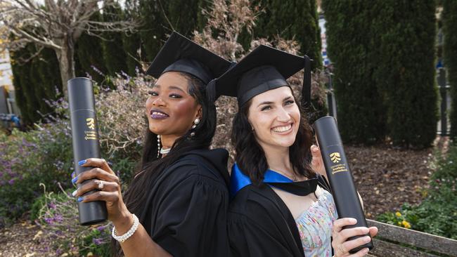 Master of General Nursing (Clinical) graduate Roslyn Kamara (left) celebrates with Bachelor of Nursing graduate Jacinta Gilson at a UniSQ graduation ceremony at The Empire, Tuesday, June 25, 2024. Picture: Kevin Farmer