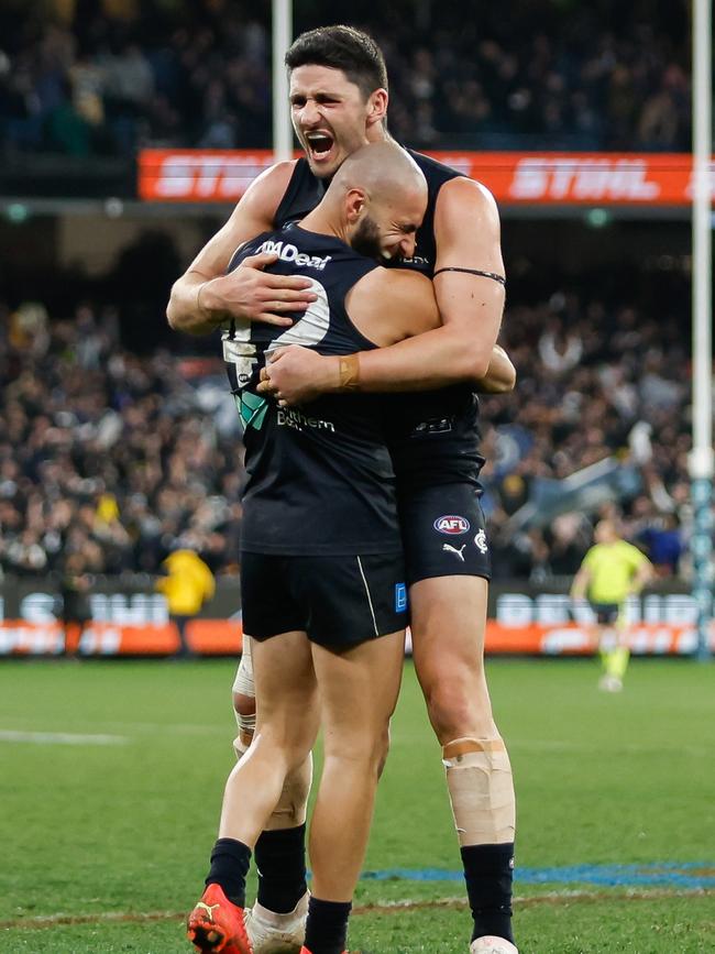 Blues Marc Pittonet and Adam Saad after the win on Saturday night. Picture: Dylan Burns/AFL Photos