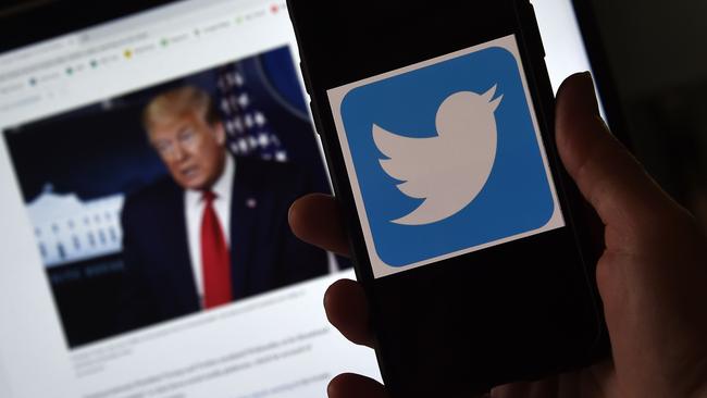 On May 27 US President Donald Trump threatened to shutter social media platforms after Twitter acted against his false tweets for the first time. Picture: AFP