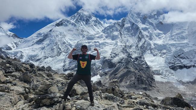 Jason Marsland taking the Tasmanian Football Club Guernsey to new heights, wearing it while completing the Three Passes unguided trek through the Himalayas, including Everest base camp. Picture: Supplied