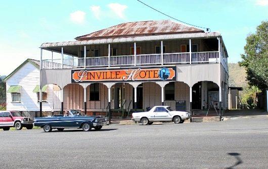 Publicans Bernie and Debbie Kerr serve their last drinks at the Linville Hotel after nearly 36 years in the business. Picture: Contributed