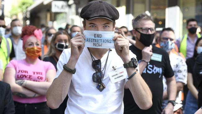 Hospitality operators line the city’s Peel Street to campaign for increased capacity limits. Picture: NCA NewsWire/Naomi Jellicoe.