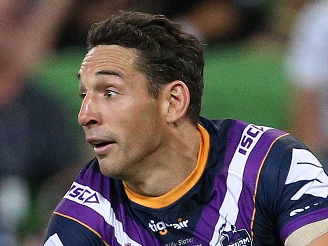 Billy Slater of the Storm runs the ball forward during the Round 2 NRL match between the Melbourne Storm and the Wests Tigers at AAMI Park in Melbourne, Saturday, March 17, 2018. (AAP Image/Hamish Blair) NO ARCHIVING, EDITORIAL USE ONLY