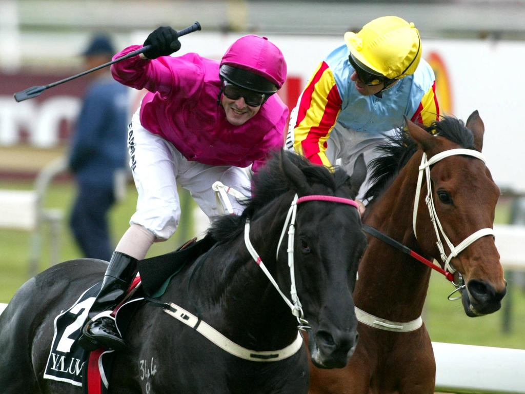 12/10/2002.  Caulfield race 7. Lonhro wins with Darren Beadman aboard (Cerise) and Sunline with Greg Childs in the saddle comes second. Yalumba Stakes. digital image. racing