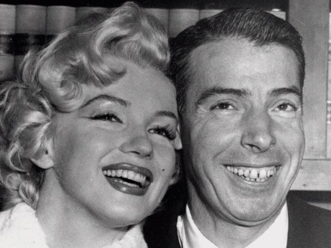 Behind the smiles... DiMaggio beat Monroe and was bitterly jealous.