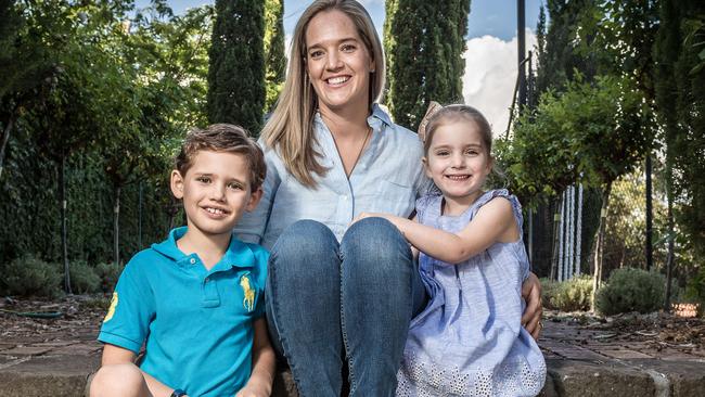 Ainslie Pettitt was 12 weeks pregnant with daughter Isobel when she was diagnosed with breast cancer. Pictured with her two children Henry, 7, and Isobel, 5. Picture: Jake Nowakowski