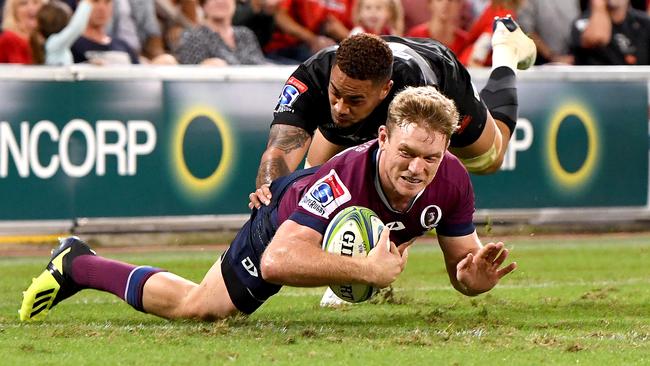 BRISBANE, AUSTRALIA - MAY 03: Bryce Hegarty of the Reds scores a try during the round 12 Super Rugby match between the Reds and the Sunwolves at Suncorp Stadium on May 03, 2019 in Brisbane, Australia. (Photo by Bradley Kanaris/Getty Images)