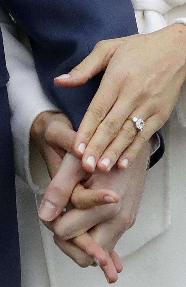 Meghan Markle’s engagement ring as designed by Harry with two diamonds belonging to his late mother, Diana, Princess of Wales. Picture: AP/Matt Dunham