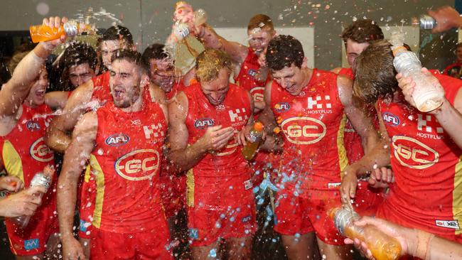 Absolute scenes in the Suns’ rooms after their come-from-behind win over Fremantle. Picture: Getty Images