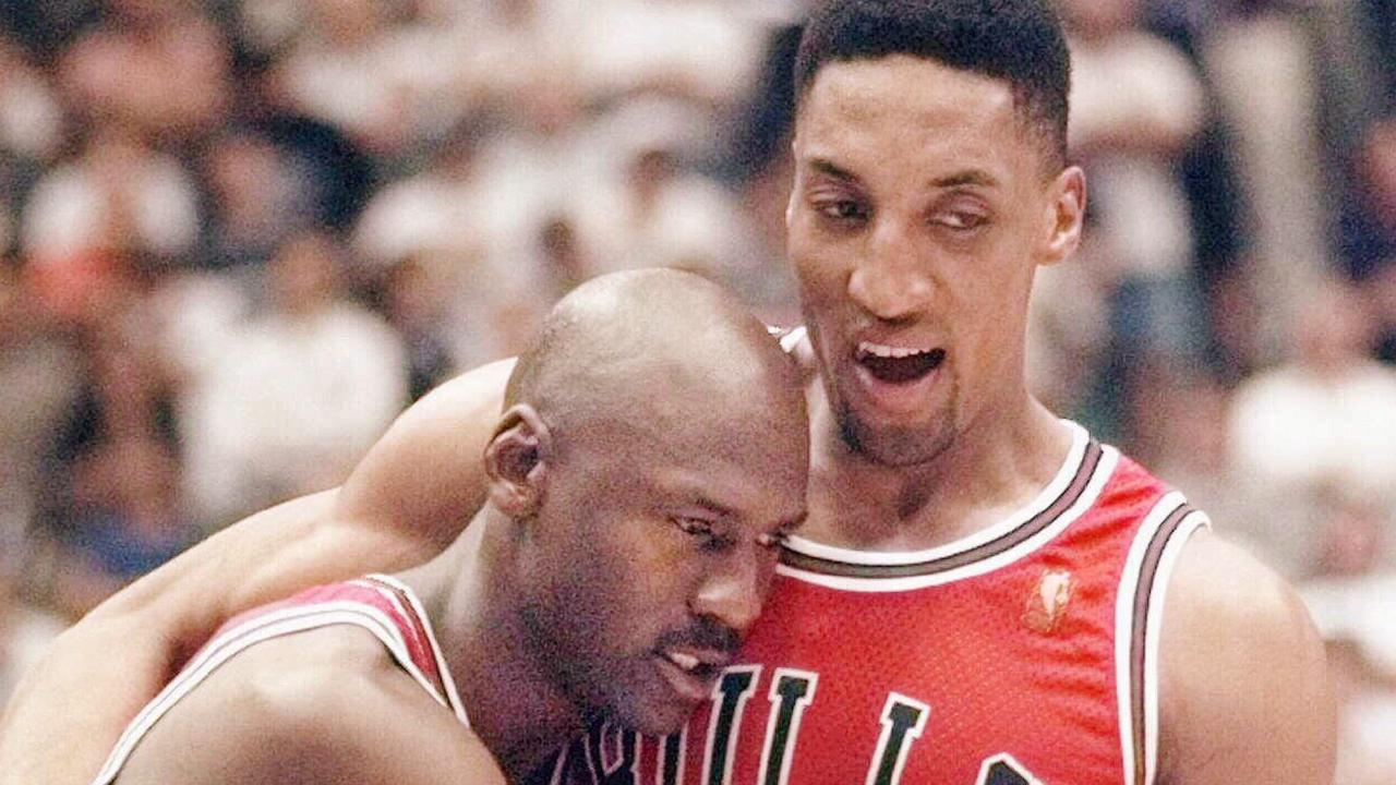Michael Jordan collapses in the arms of teammate Scottie Pippen, during the . (AP Photo/Tom Cruze) /basketball