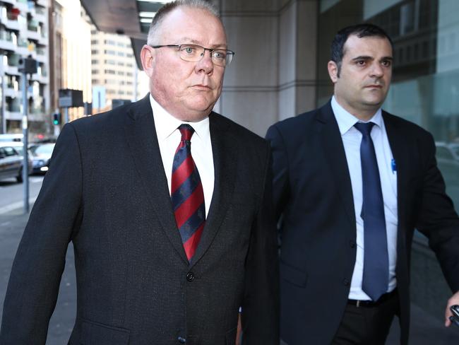 NSW Police Assistant Commissioner Mark Jenkins leaves the Lindt Cafe siege inquest.