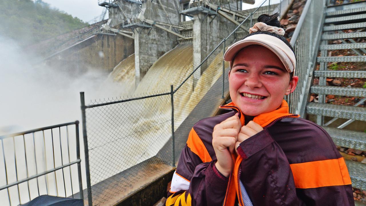 Kristy-Rose Williams, 16, at Ross River Dam as it releases water due to flooding rain. Picture: Zak Simmonds