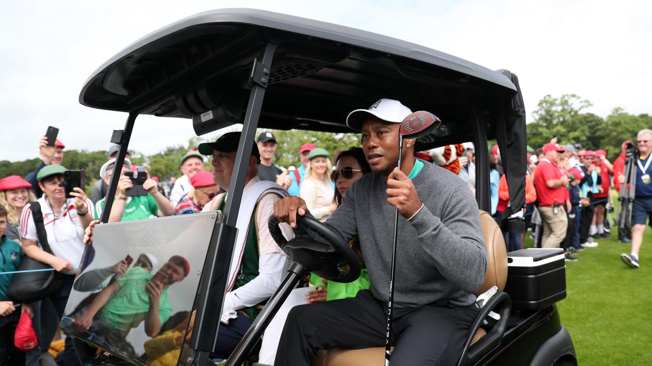 Tiger Woods took the cart. Photo by Oisin Keniry/Getty Images