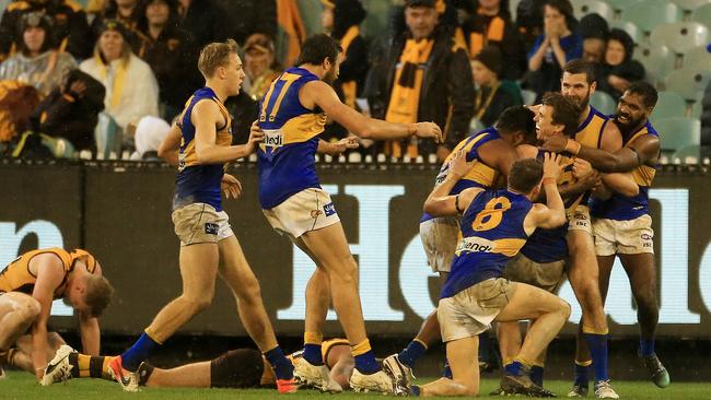 2019 AFL Football Round 15 - Hawthorn V West Coast Eagles at the MCG. West Coast celebrate a Jamie Cripps goal late in the fourth. Picture: Mark Stewart