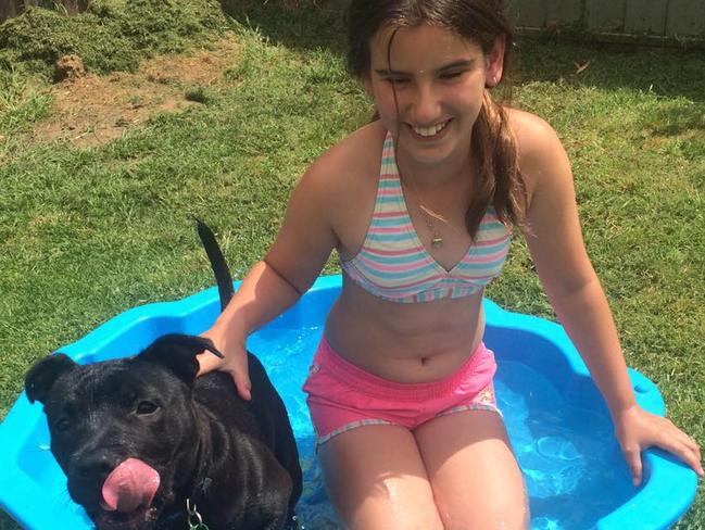 Zoe Buttigieg, 11, with beloved dog Jax at home in Wangaratta, where she was murdered by prison parolee Bowe Maddigan. Picture: Facebook