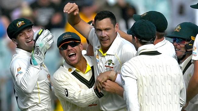 Scott Boland celebrates after dismissing Jack Leach.