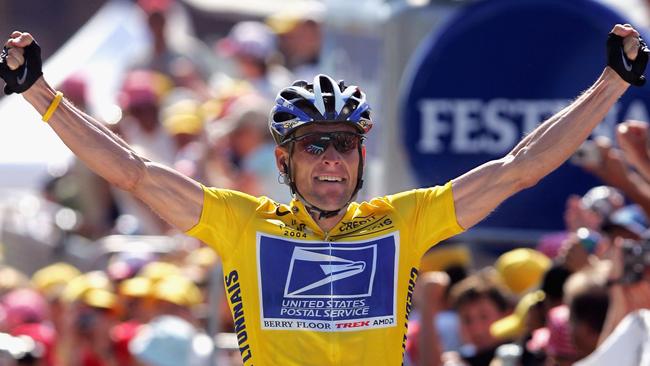 Lance Armstrong celebrates winning a stage in the 2004 Tour de France. In 2013, Armstrong admitted he had been a drug cheat during each of his seven Tour de France victories. Picture: Doug Pensinger/Getty Images