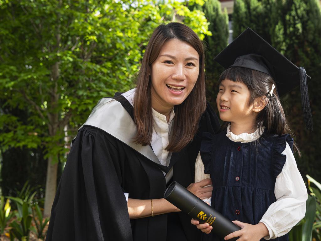 Graduate Diploma of Business graduate Suik May Kew with daughter Eliza Kew at a UniSQ graduation ceremony at The Empire, Wednesday, October 30, 2024. Picture: Kevin Farmer