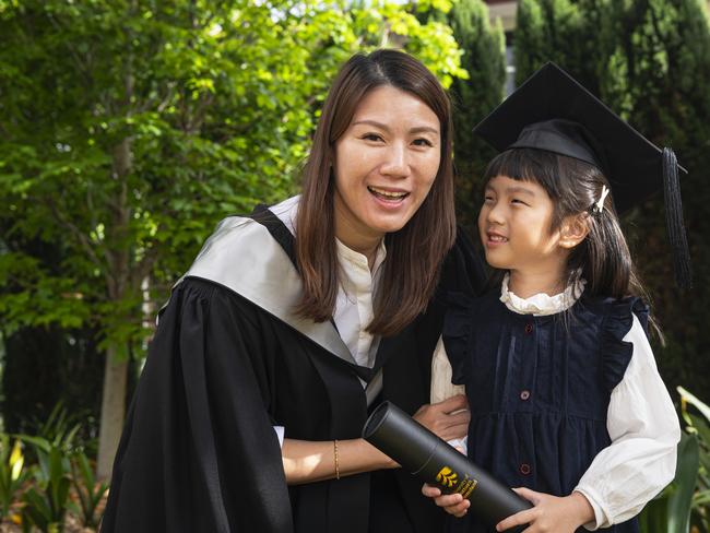 Graduate Diploma of Business graduate Suik May Kew with daughter Eliza Kew at a UniSQ graduation ceremony at The Empire, Wednesday, October 30, 2024. Picture: Kevin Farmer