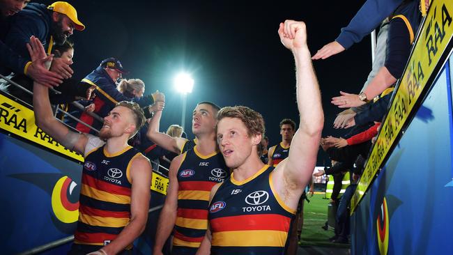 Sloane celebrates with fans after the round 15 AFL match against the West Coast Eagles. Picture: Daniel Kalisz/Getty Images